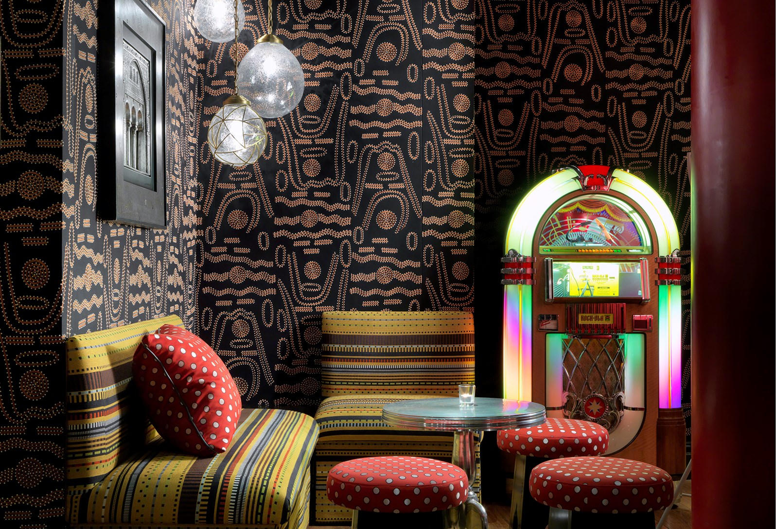 Vibrant lounge at The Crimson Bar, Soho Hotel, ideal for networking events and meetings.
