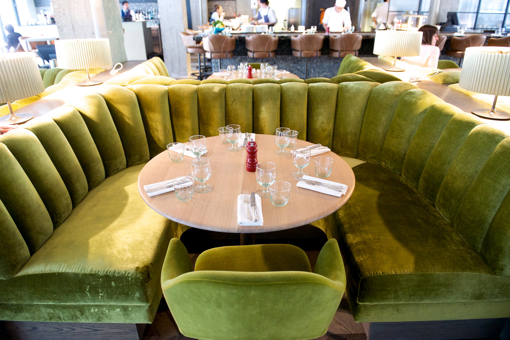 Whole Venue Exclusive Hire: vibrant green seating for intimate meetings and social events.