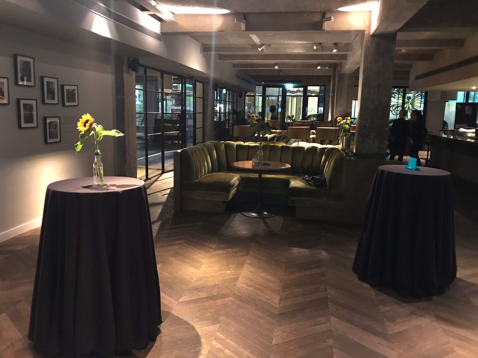 Stylish meeting space with cozy green seating for networking events in Stephen Street Terrace.