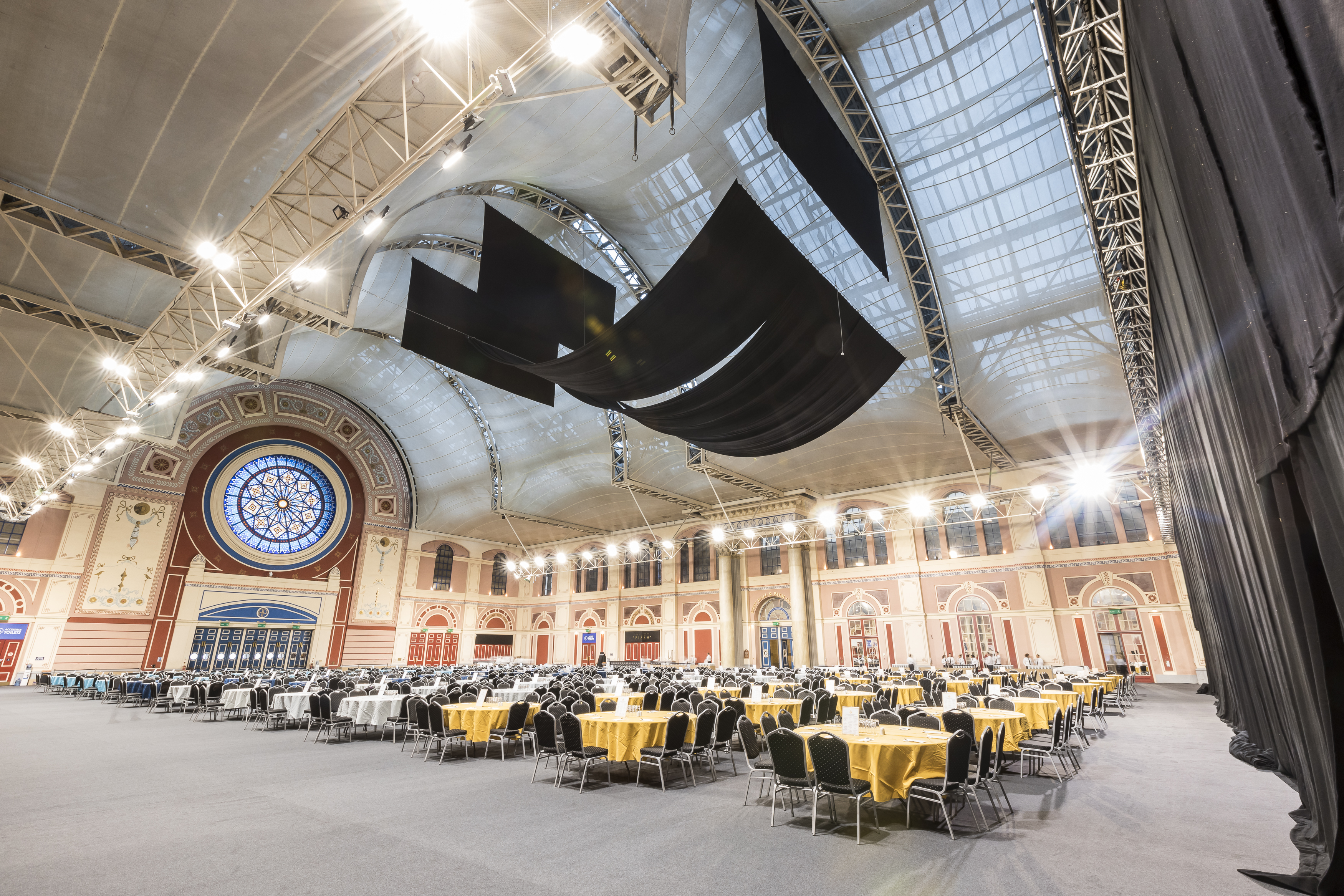 Great Hall at Alexandra Palace, elegant round tables for formal events and banquets.