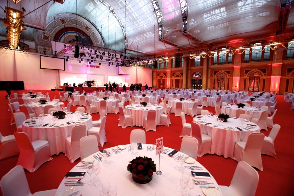 Great Hall at Alexandra Palace set for a formal dinner event with elegant tables.