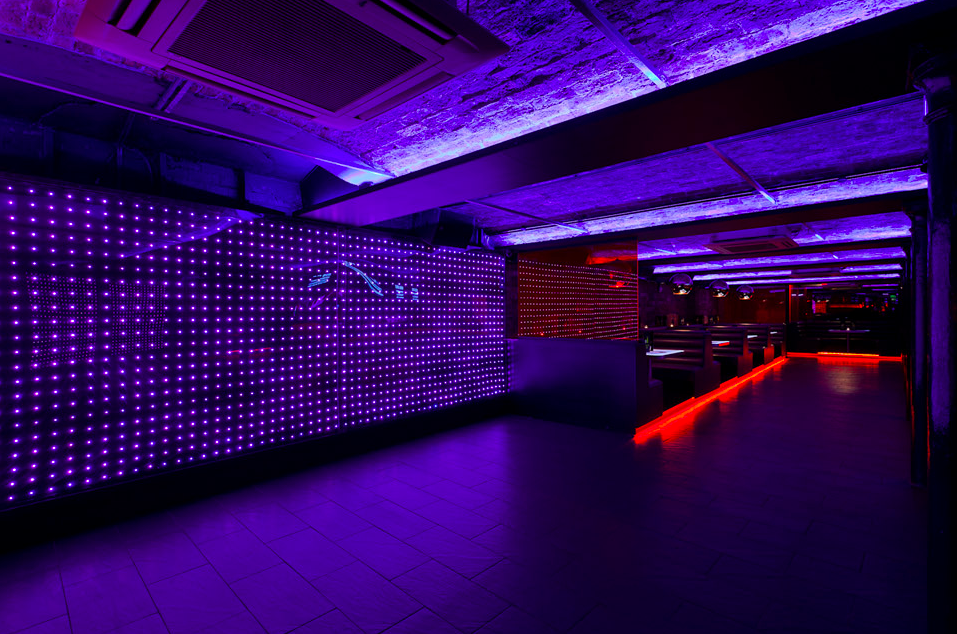 Modern event space at Baa Bar with dynamic LED lighting for nightlife and corporate events.
