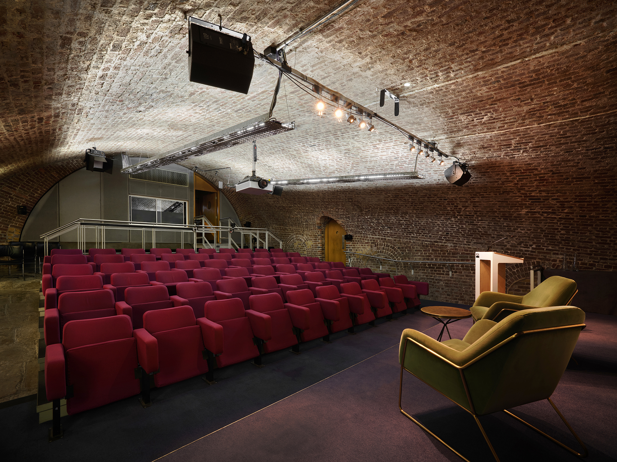 Durham Street Auditorium: intimate venue with plush seating for conferences and workshops.