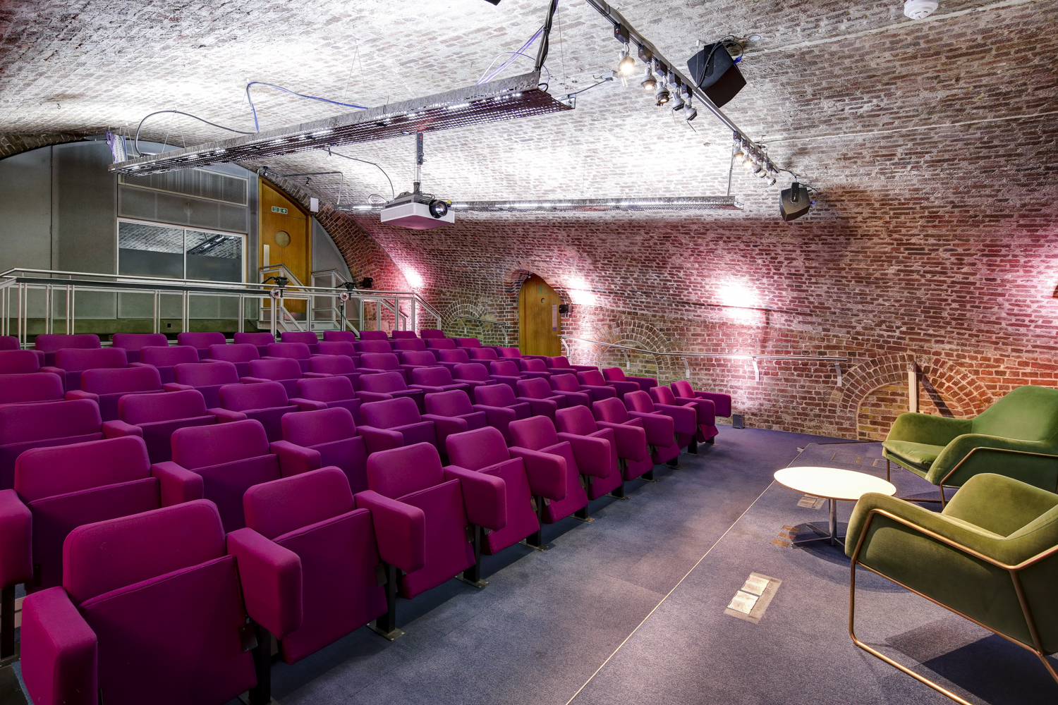 Durham Street Auditorium with brick archway, ideal for conferences and workshops.