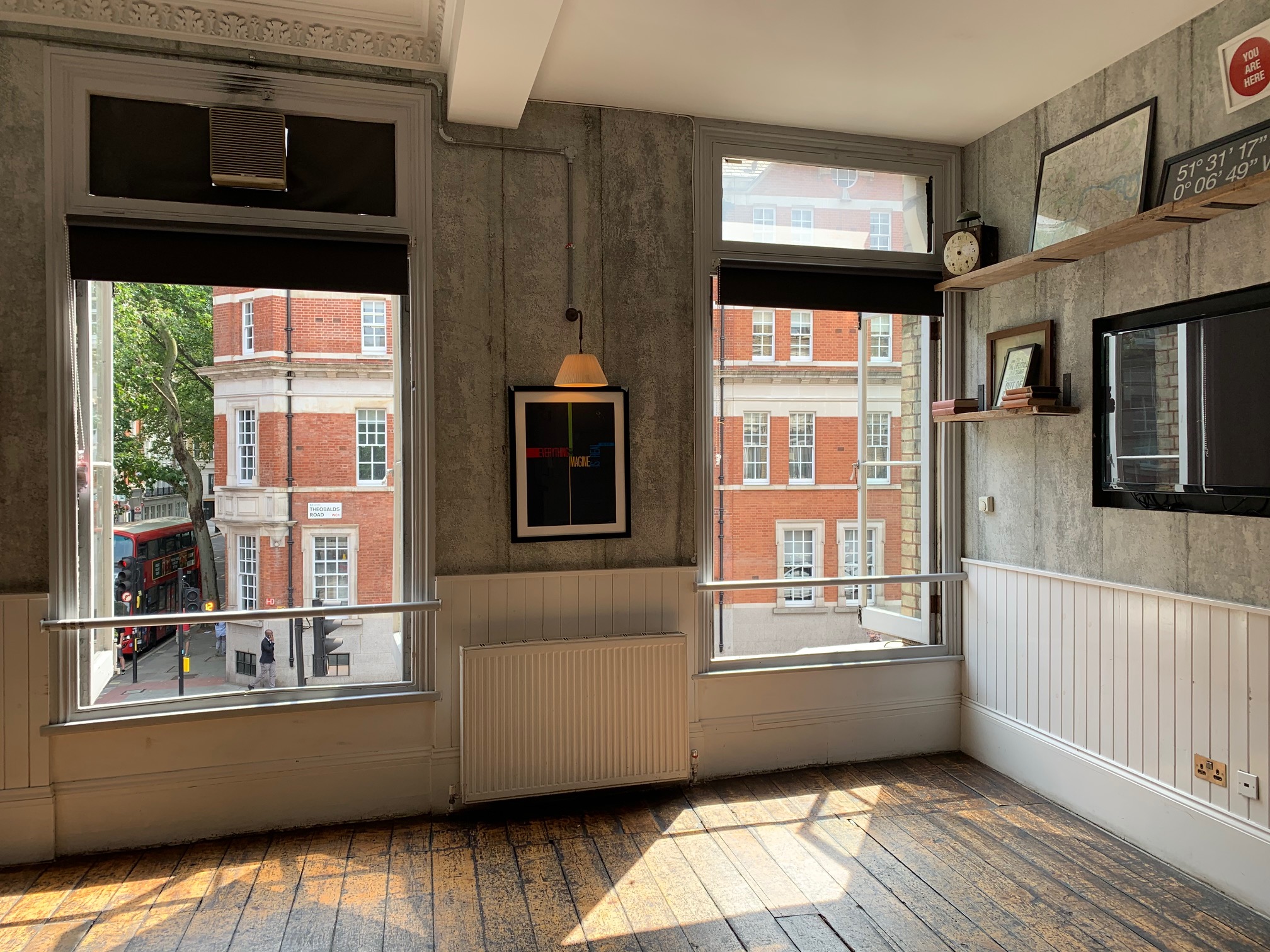 Stylish meeting room with large windows at The Yorkshire Grey for events and gatherings.