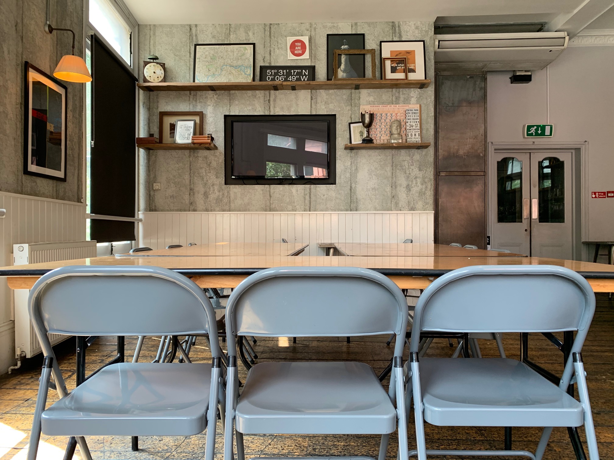 Modern meeting room at The Yorkshire Grey with long table, ideal for workshops and presentations.