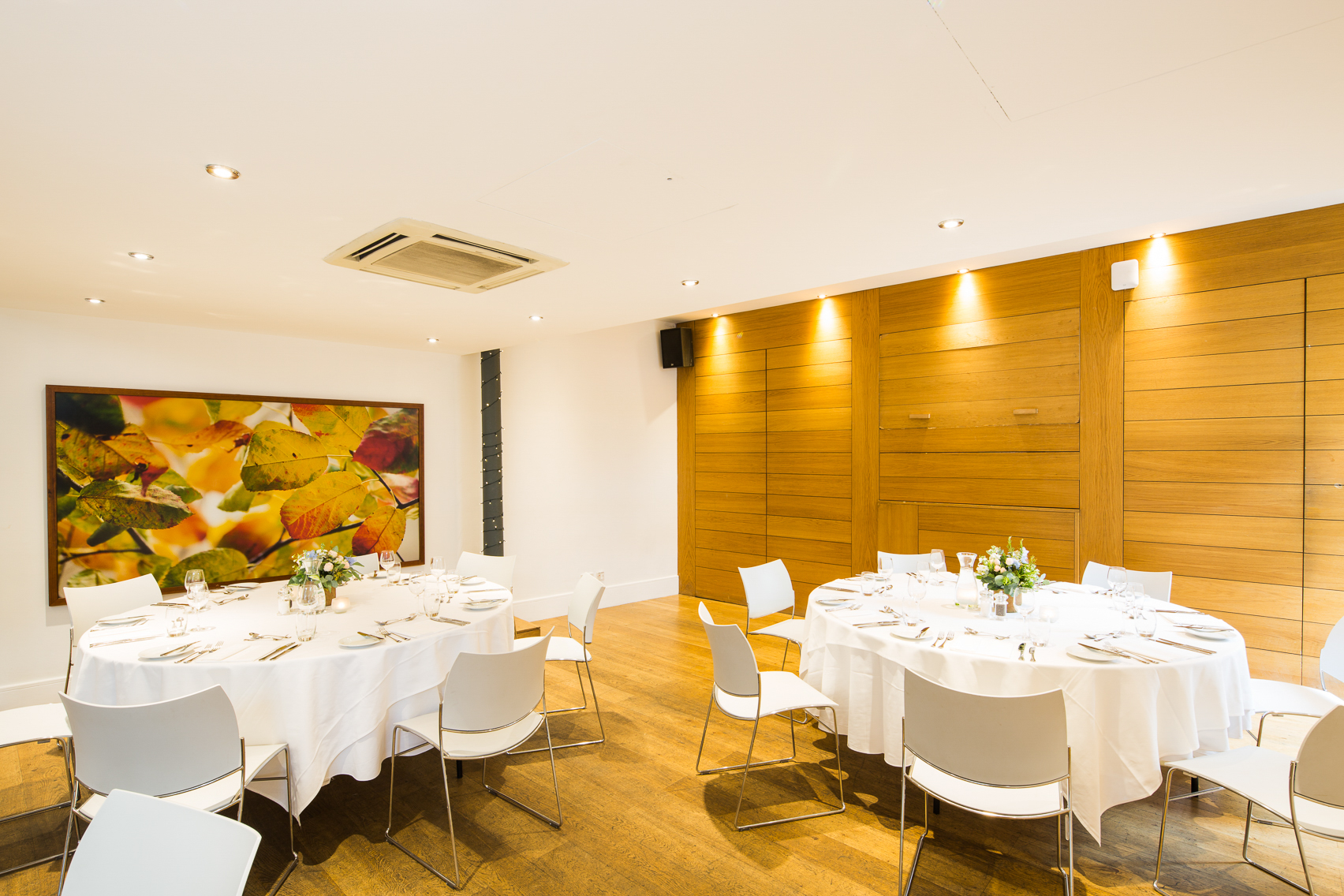 Hope Street Hotel Conference Room with elegant round tables for meetings and banquets.