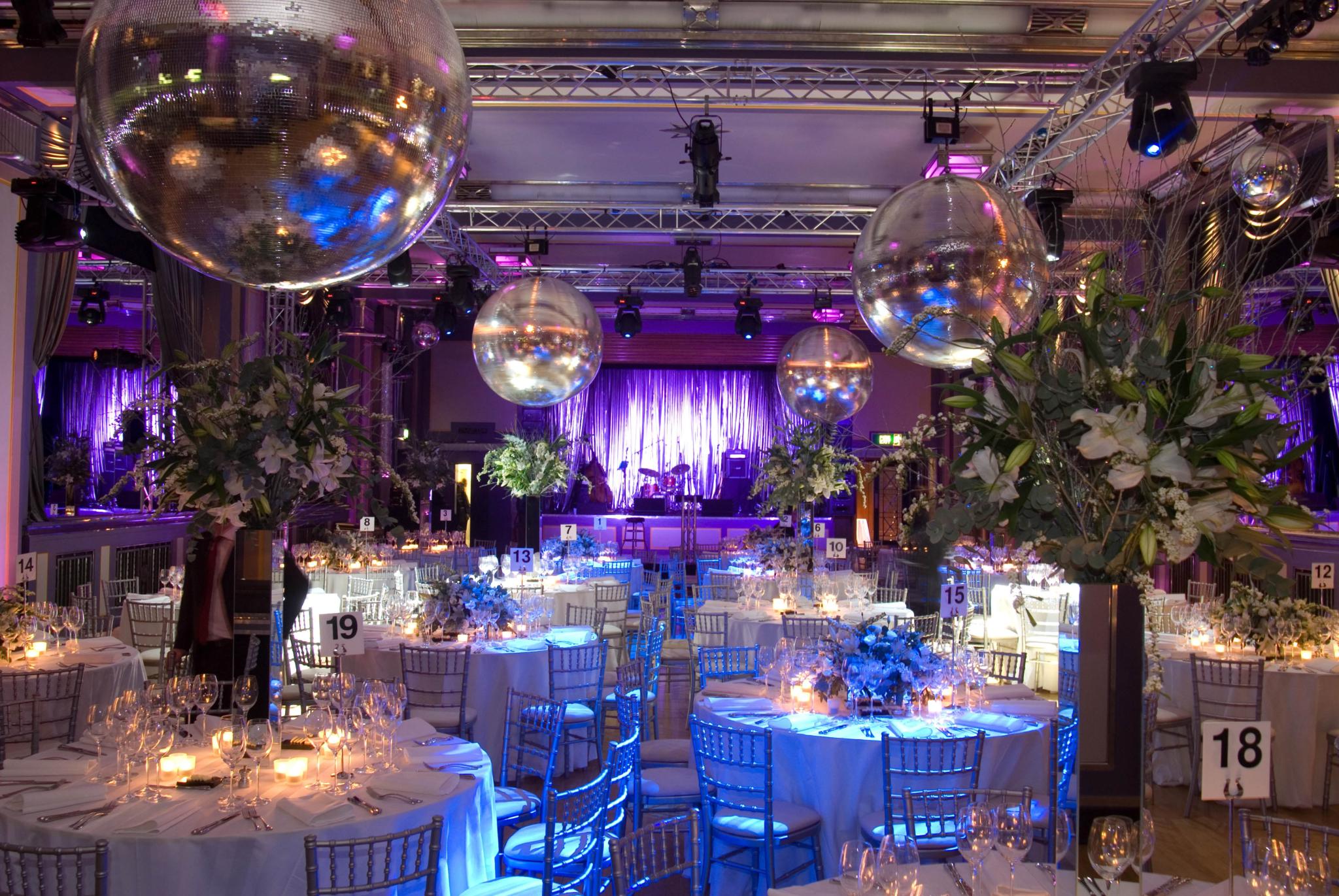 Elegant Bloomsbury Ballroom gala setup with floral centerpieces and ambient lighting.