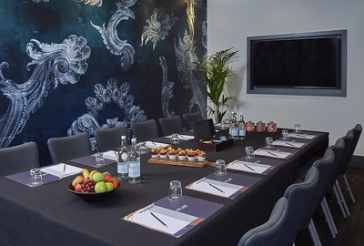 Mal One meeting room in Malmaison London, modern decor, ideal for workshops and meetings.