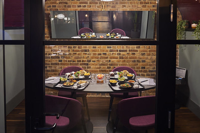Elegant meeting space at The Vaults, Malmaison London for corporate dining and gatherings.