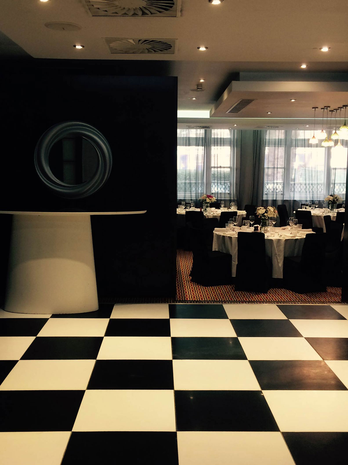 Mal Lounge in Malmaison London, elegant event space with checkered floor for upscale gatherings.