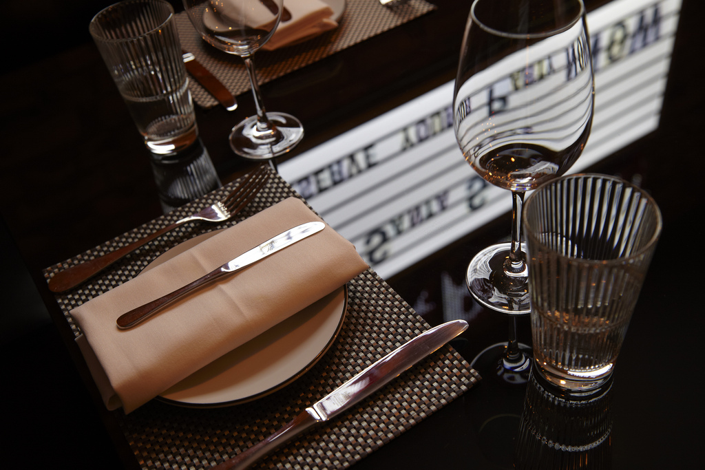 Elegant dining table setup at Chez Mal, perfect for corporate events and upscale dinners.