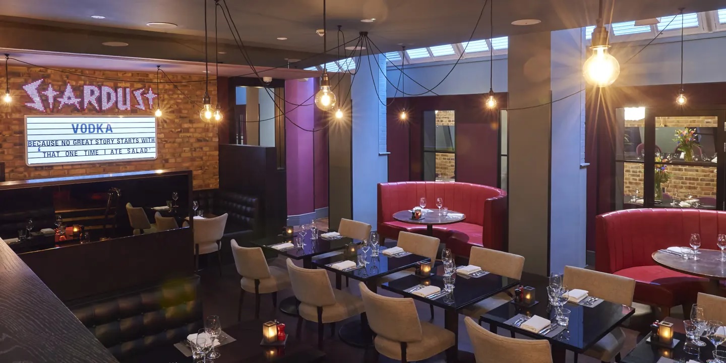 Stylish Chez Mal venue in London with cozy seating, perfect for events and gatherings.