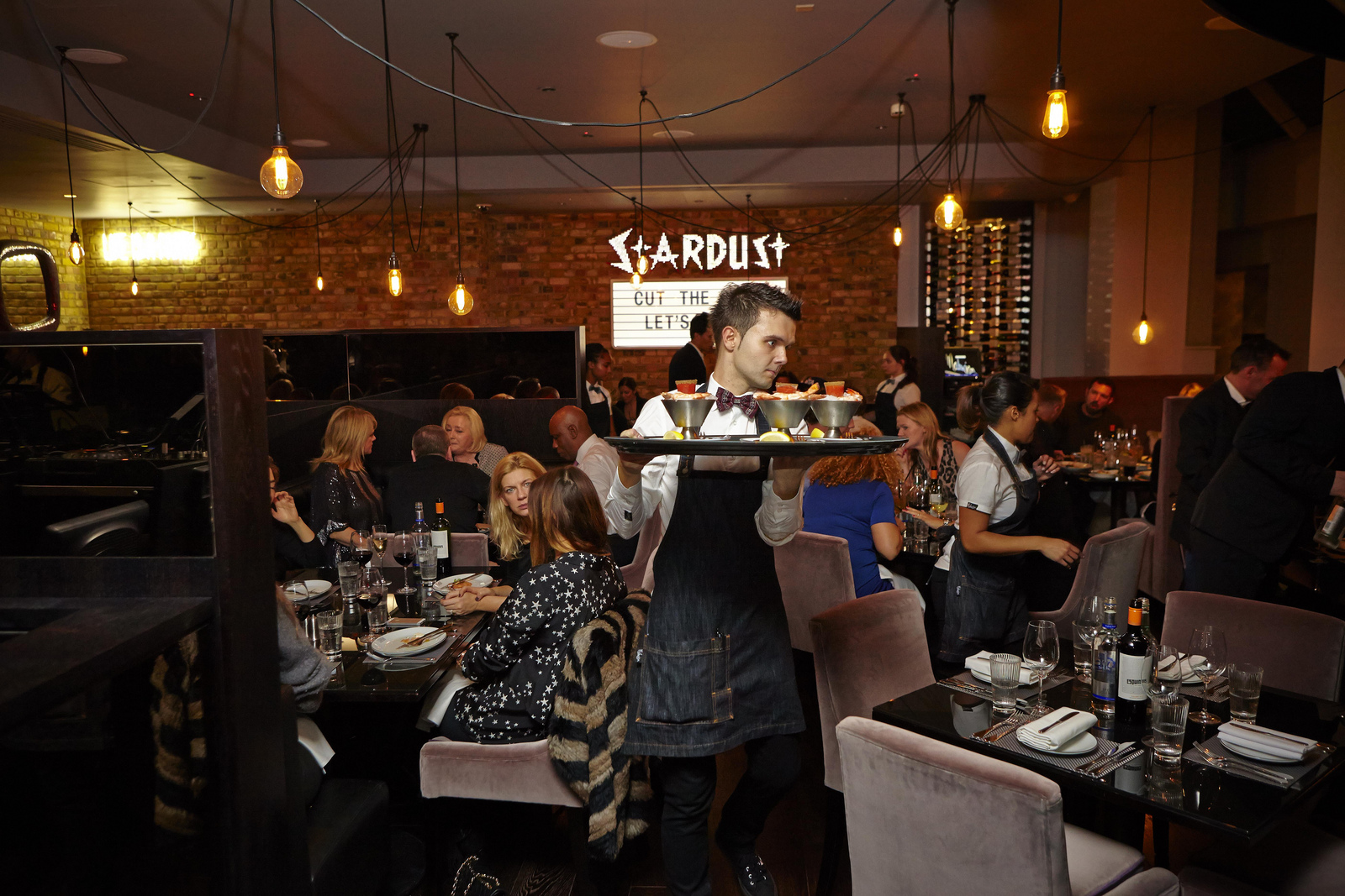 Vibrant dining at Chez Mal, Malmaison London—ideal for corporate events and celebrations.