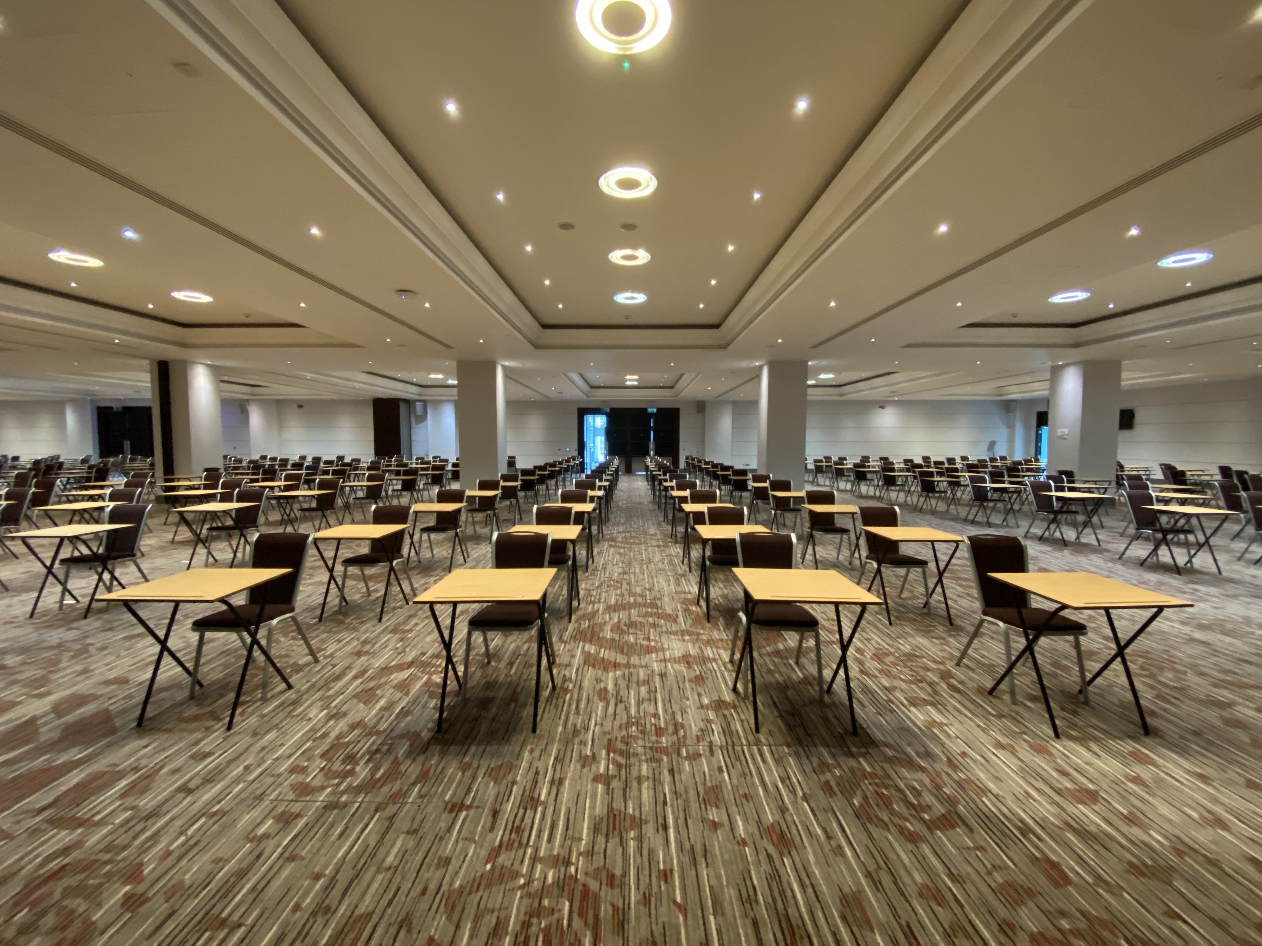 Rose Suite at Allianz Stadium: spacious conference room with social distancing setup.