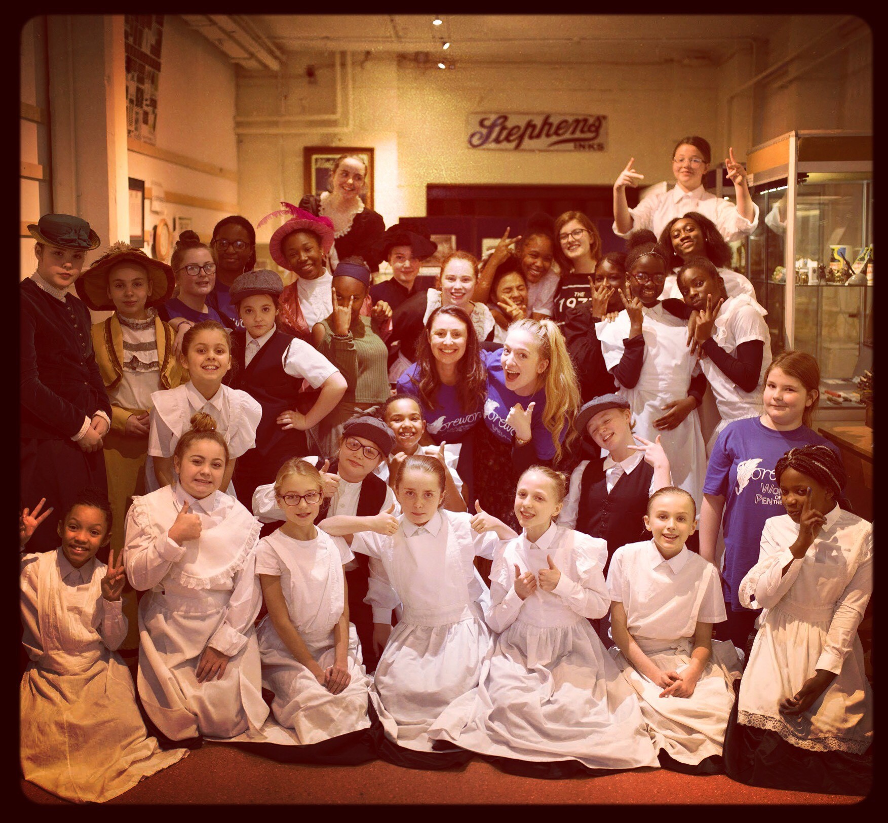 Vibrant group at Pen Museum event, showcasing community and creativity in themed gathering.