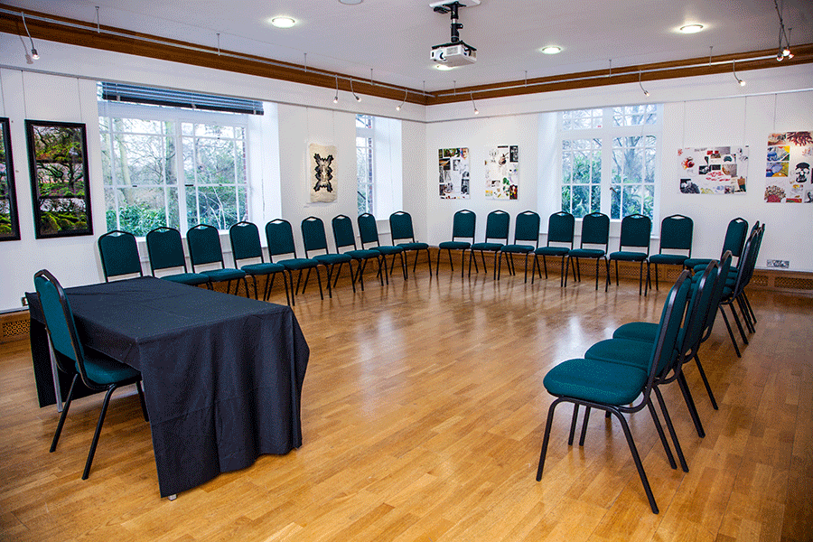 Knapp Gallery meeting space with circular seating for collaborative events and creativity.