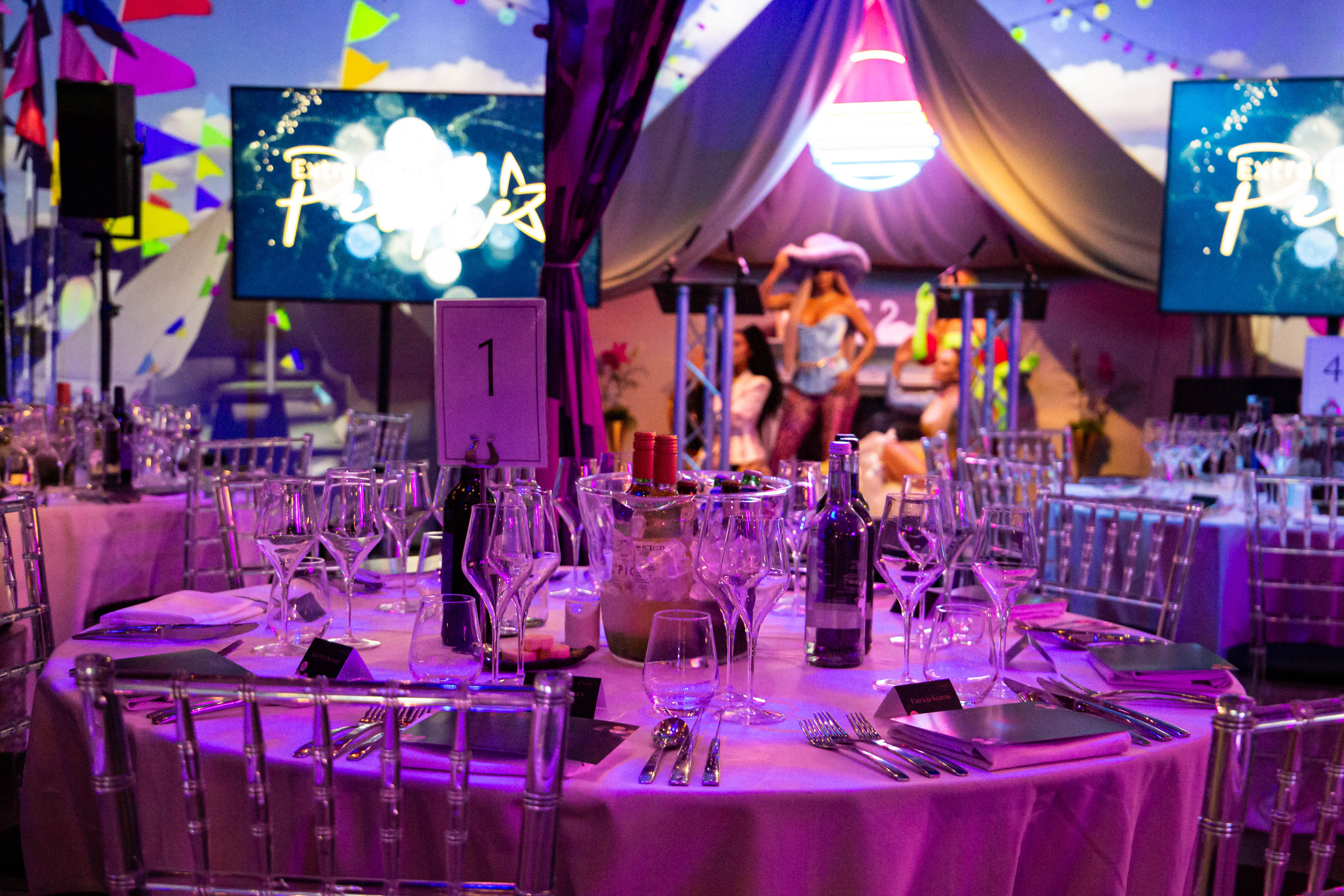 Vibrant party setup at Madame Tussauds with chiavari chairs for celebrations and events.