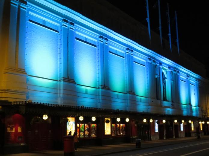 Party venue at Madame Tussauds with vibrant blue lighting for events and receptions.
