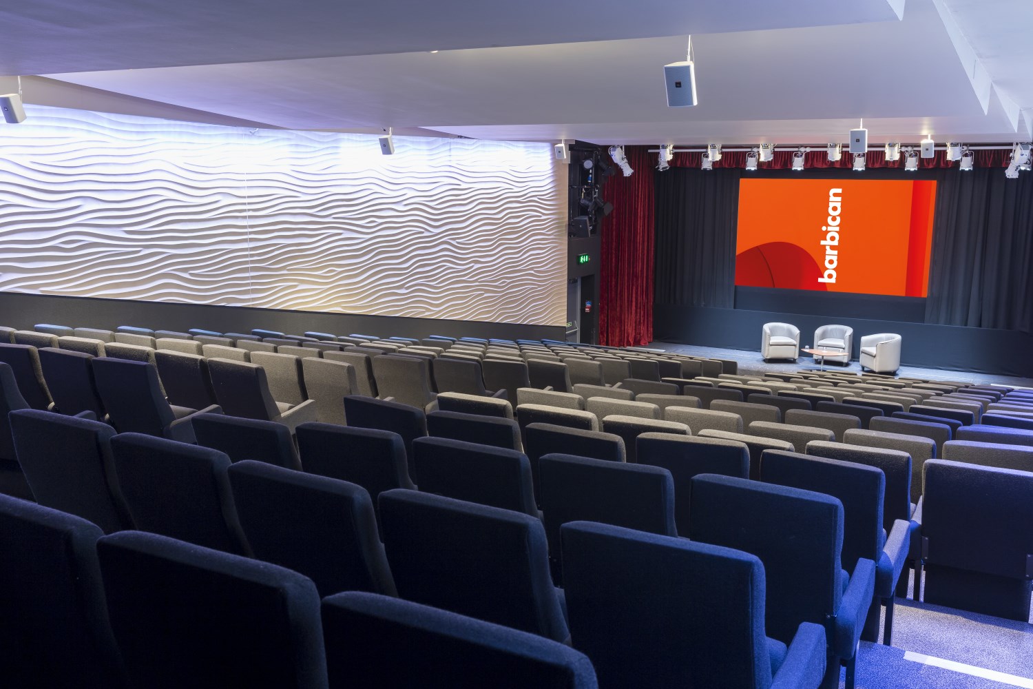 Frobisher Auditorium 2: modern event space with tiered seating for corporate meetings.