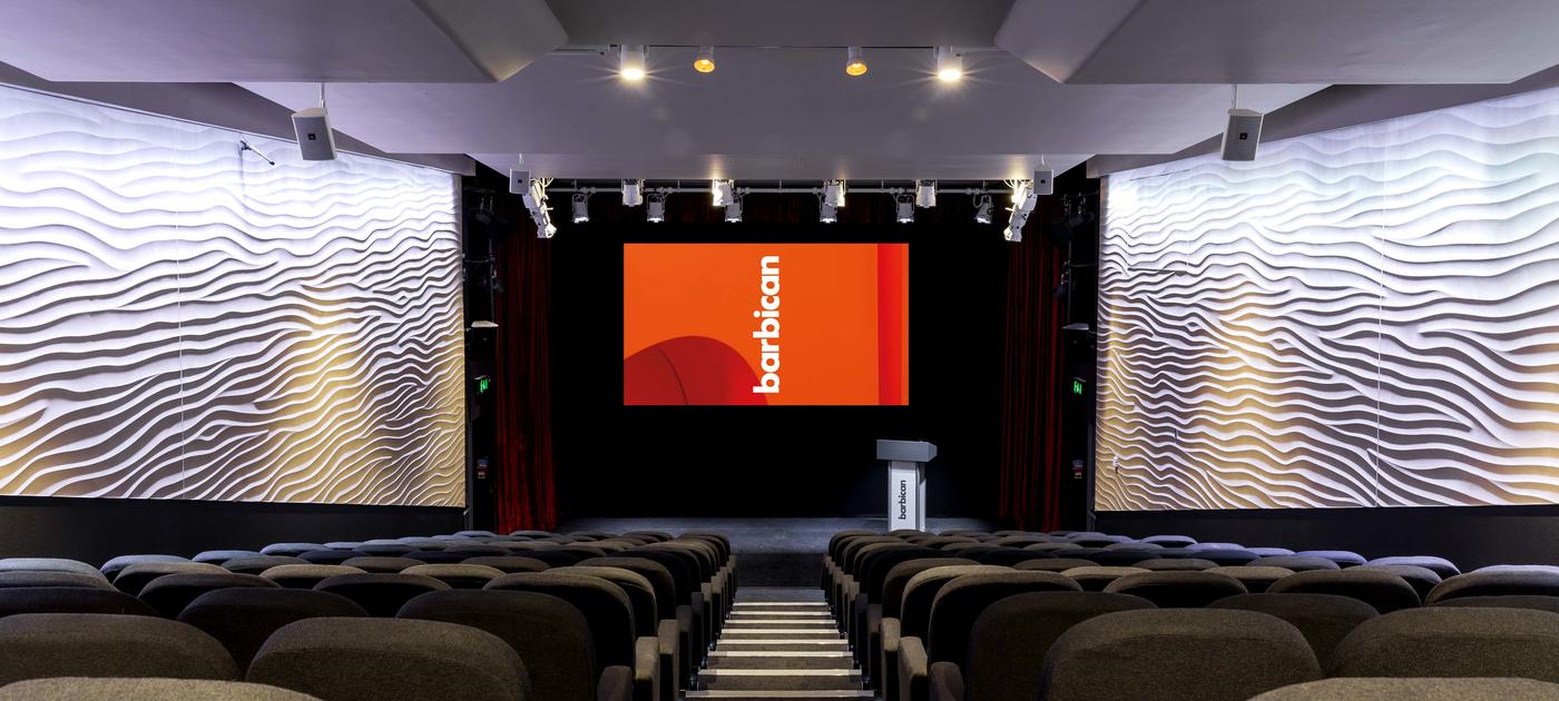 Modern Frobisher Auditorium 2 with tiered seating for conferences and presentations.