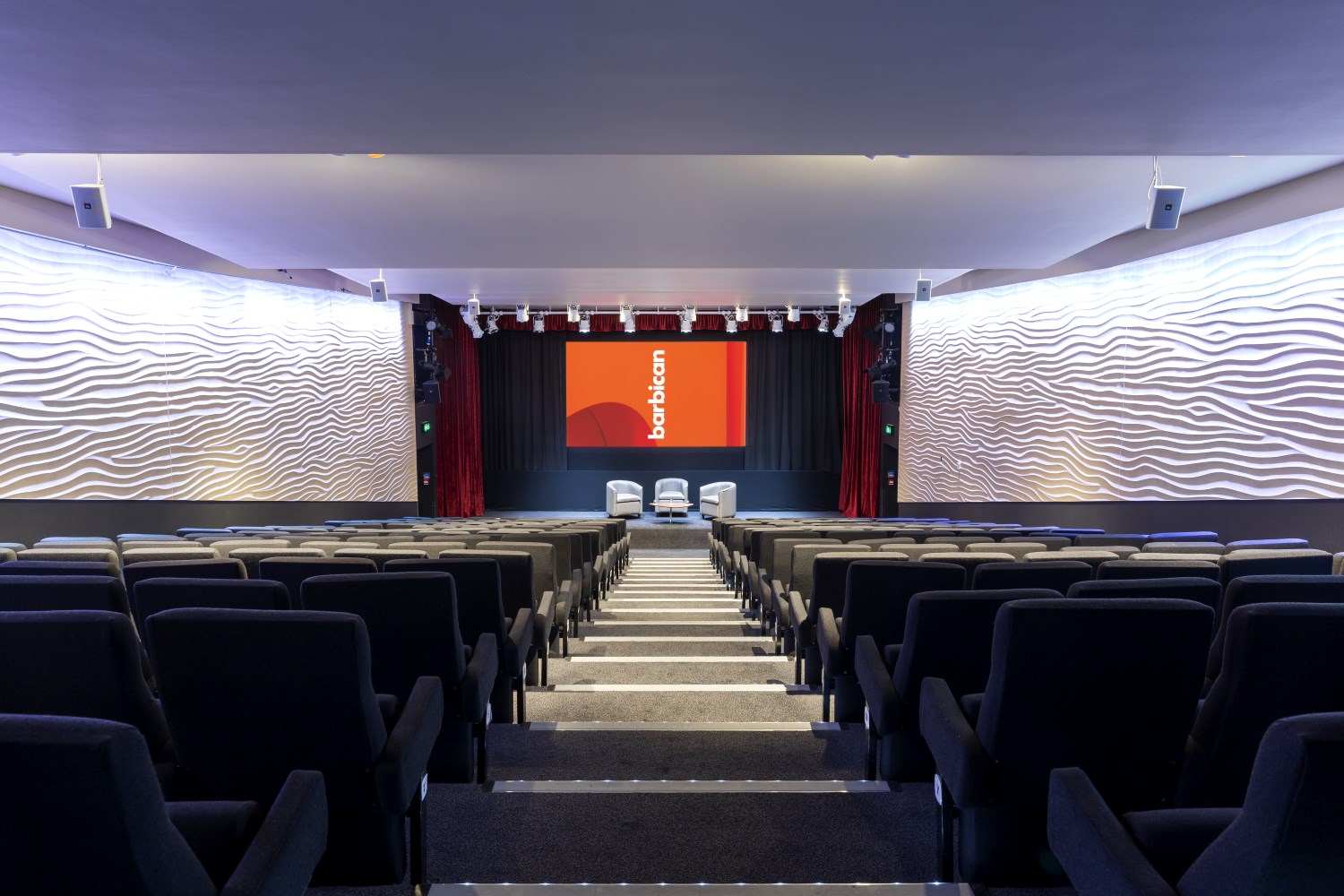 Frobisher Auditorium 2: modern event space with tiered seating for presentations and discussions.