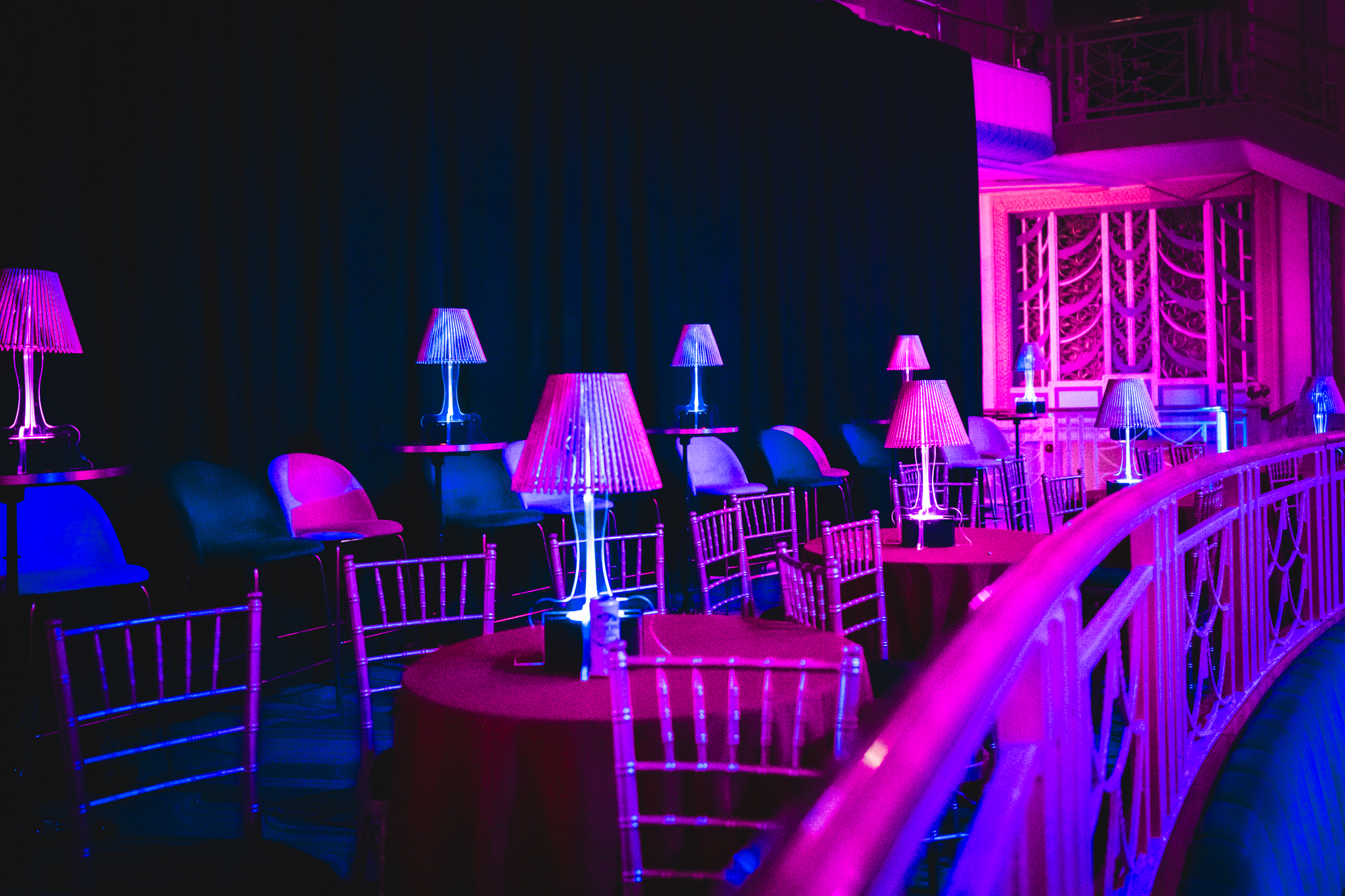 Elegant Christmas party setup at Troxy with chic tables and vibrant lighting.