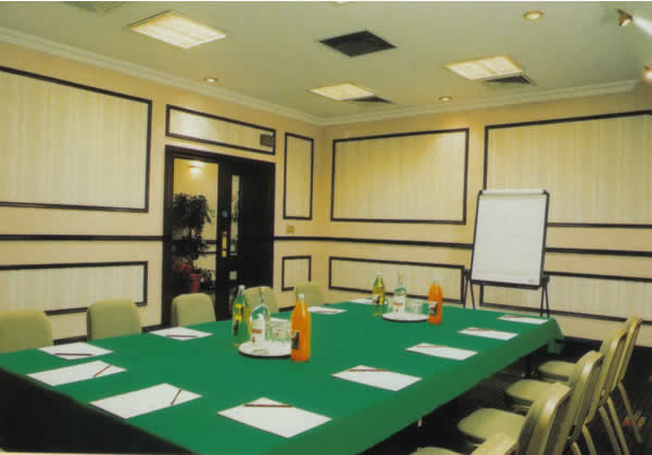 Wardroom Suite at National Conference Centre, large green table for meetings and workshops.