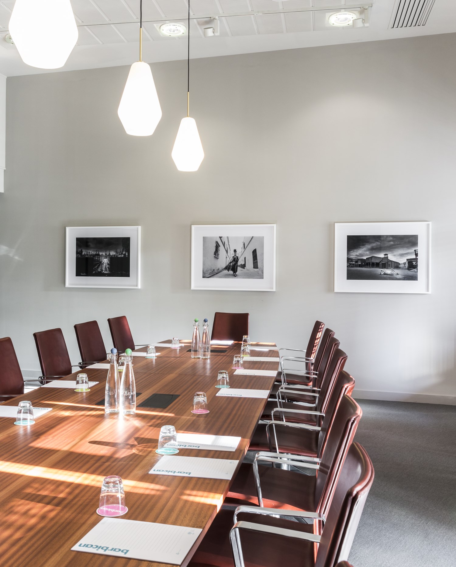 Modern Frobisher Boardroom with sleek table, ideal for professional meetings and conferences.