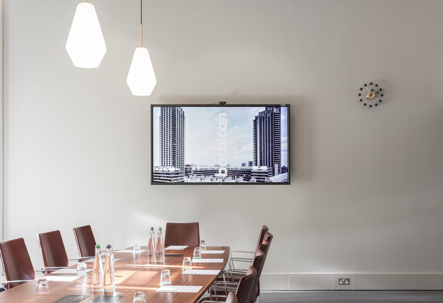 Modern Frobisher Boardroom at Barbican Centre, ideal for professional meetings and presentations.