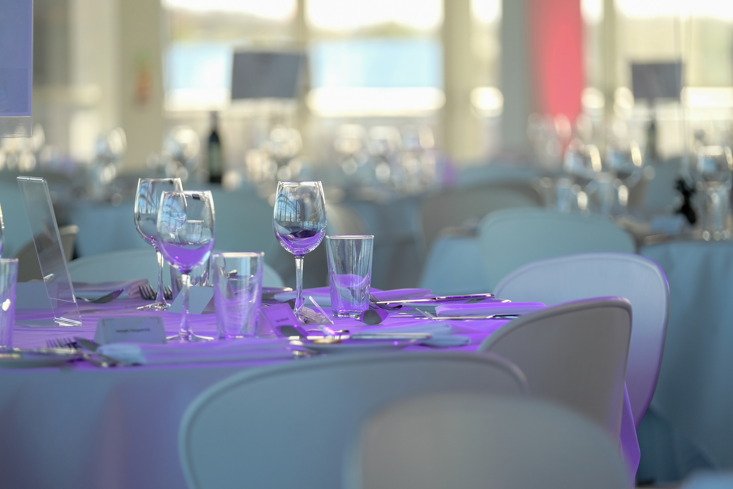 Elegant dining setup in Hall 5, Silverstone for networking events and celebrations.