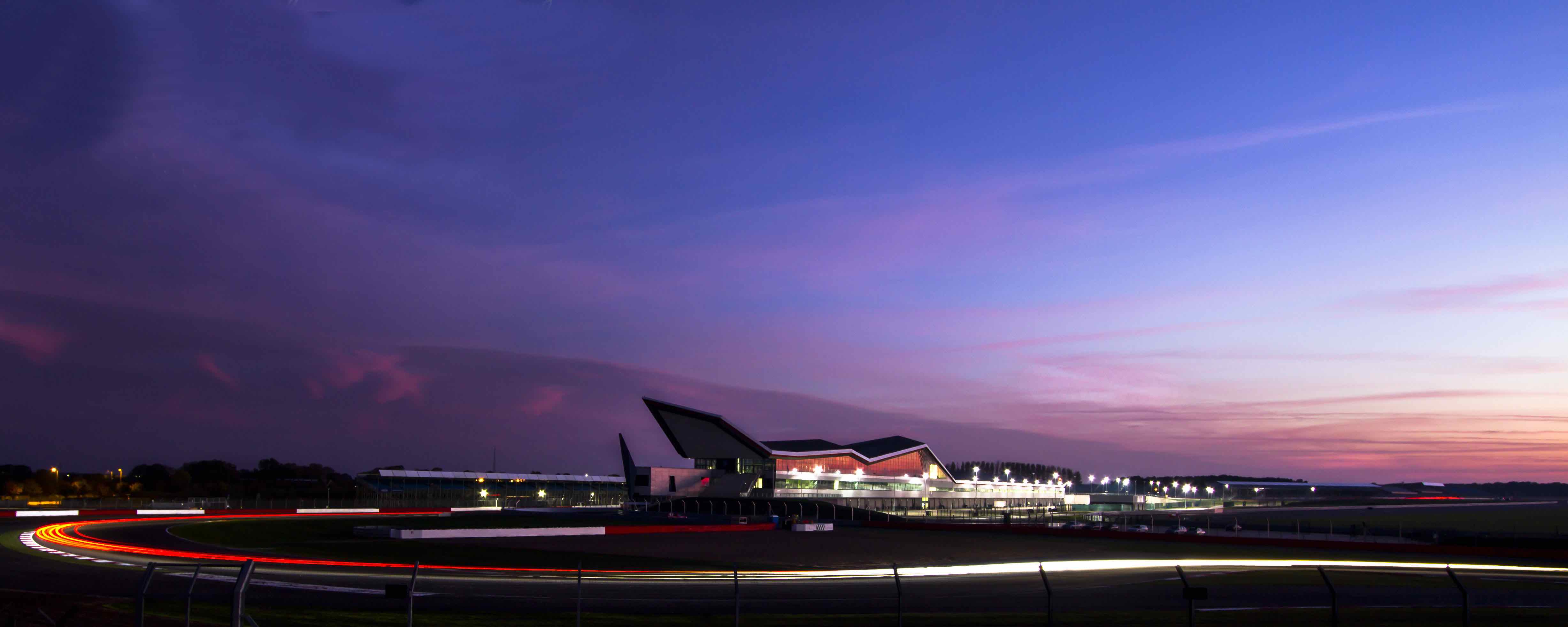 Twilight view of Silverstone Auditorium, ideal for corporate events and motorsport gatherings.