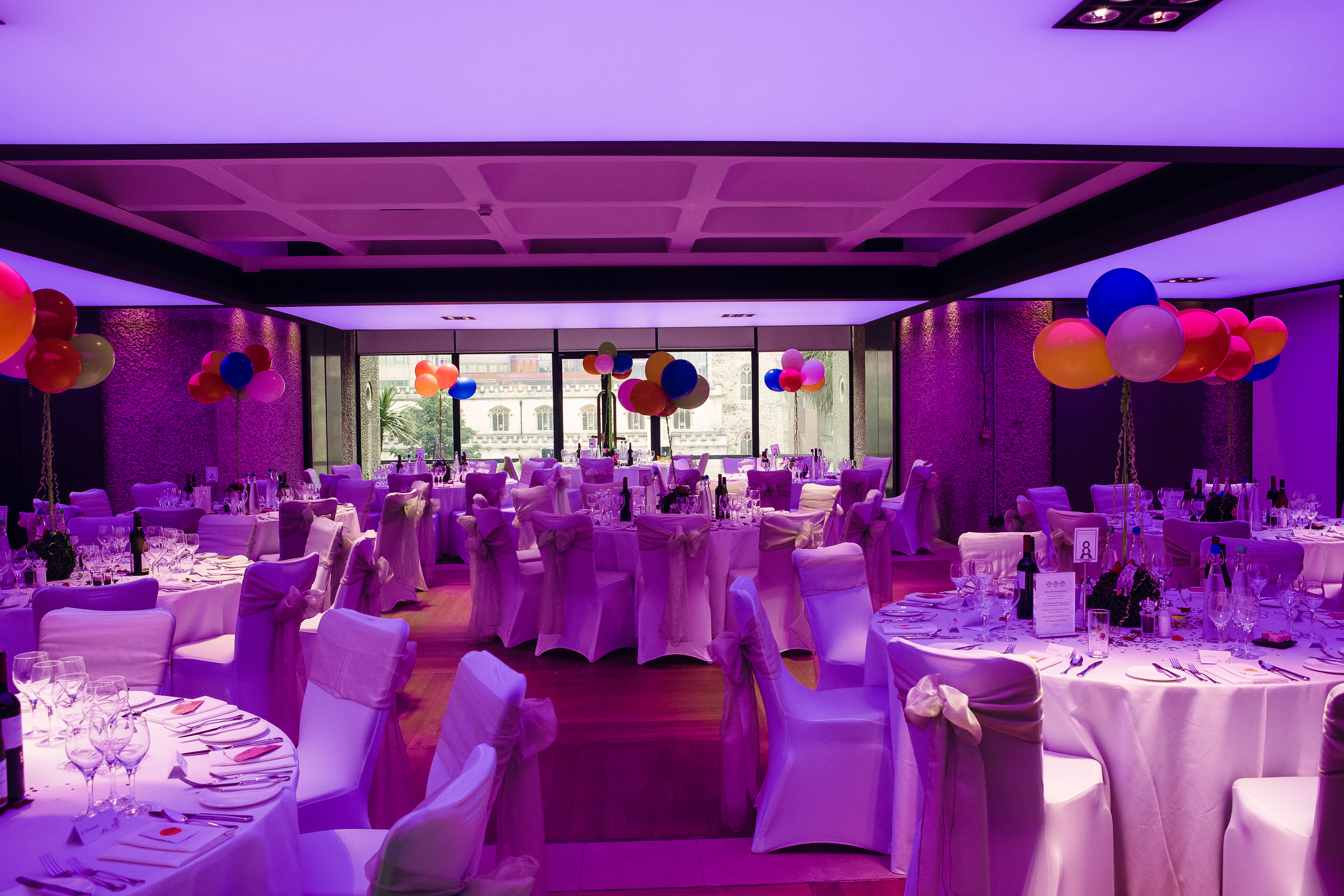 Elegant event space in Barbican Centre with fine dining setup for weddings and celebrations.