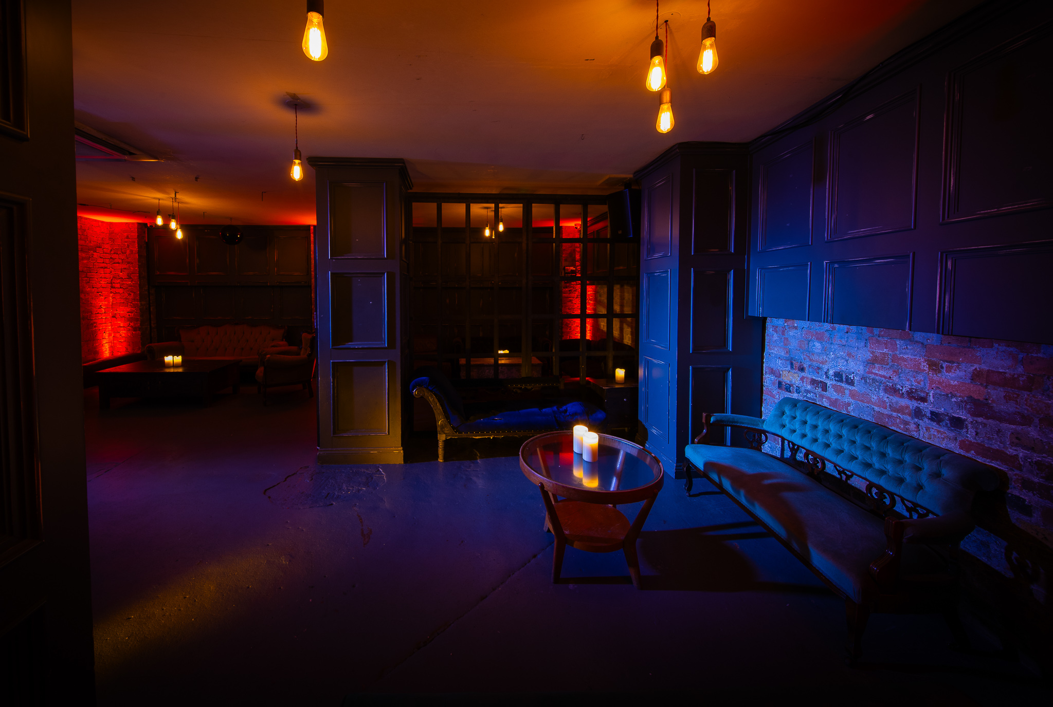 Stylish dimly lit event space at The Secret Bar, perfect for intimate gatherings and networking.