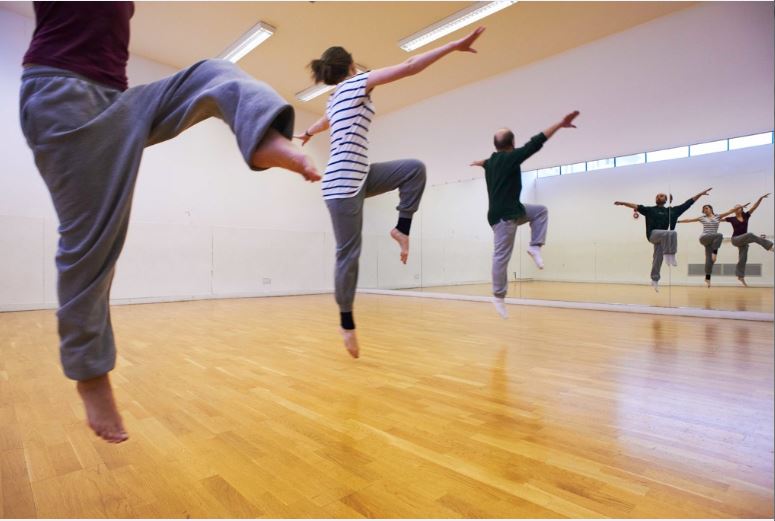 Dynamic dance rehearsal in spacious Oxford House studio, ideal for workshops and team-building.