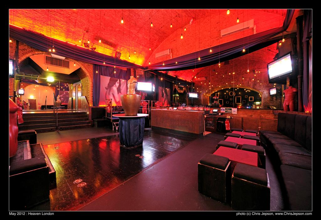 Vibrant event space with warm lighting, ideal for networking and live entertainment.
