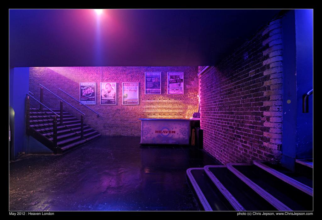 Stylish industrial event space with exposed brick, perfect for networking and social gatherings.