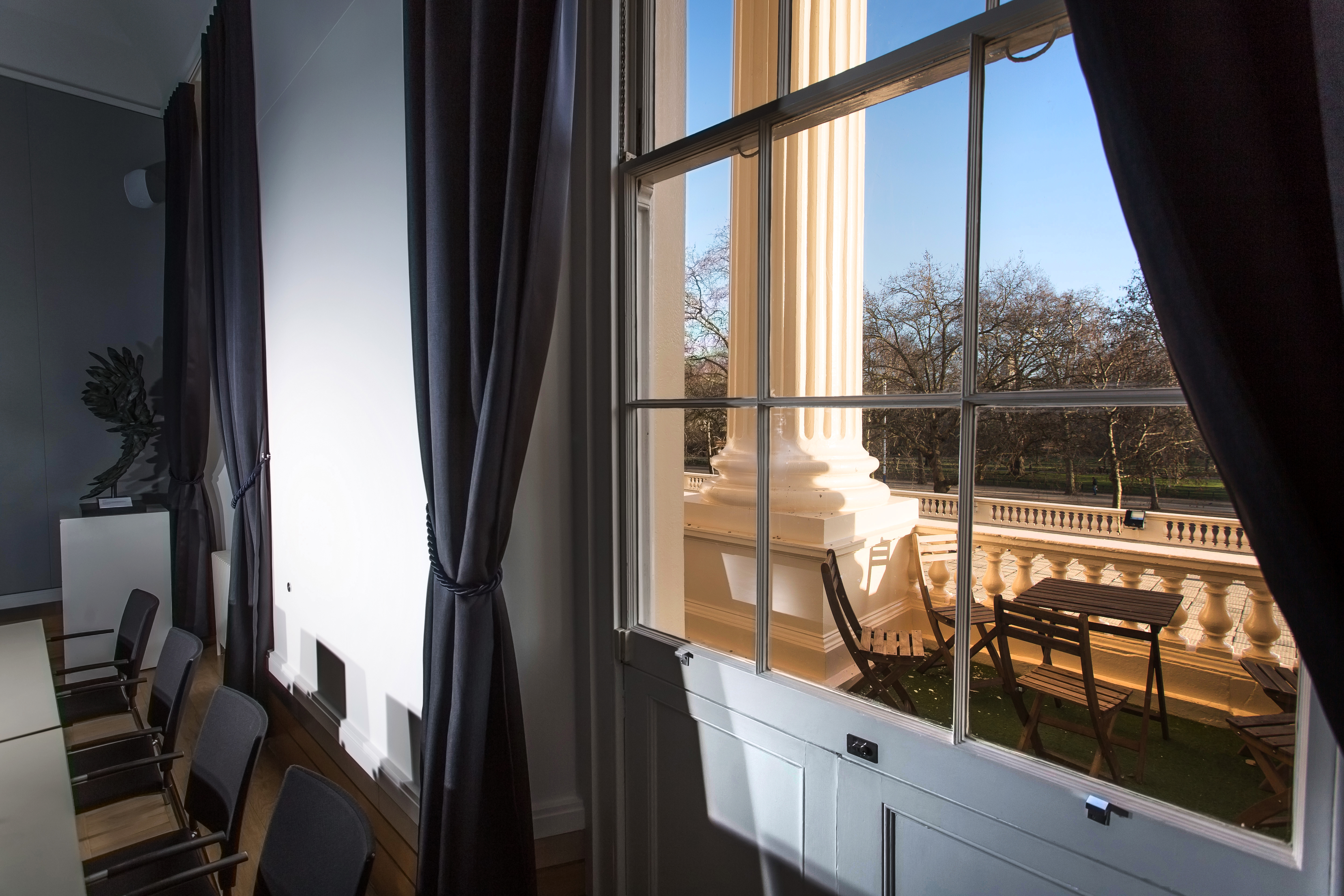 Elegant meeting space with large windows at National Grid, ideal for corporate events.