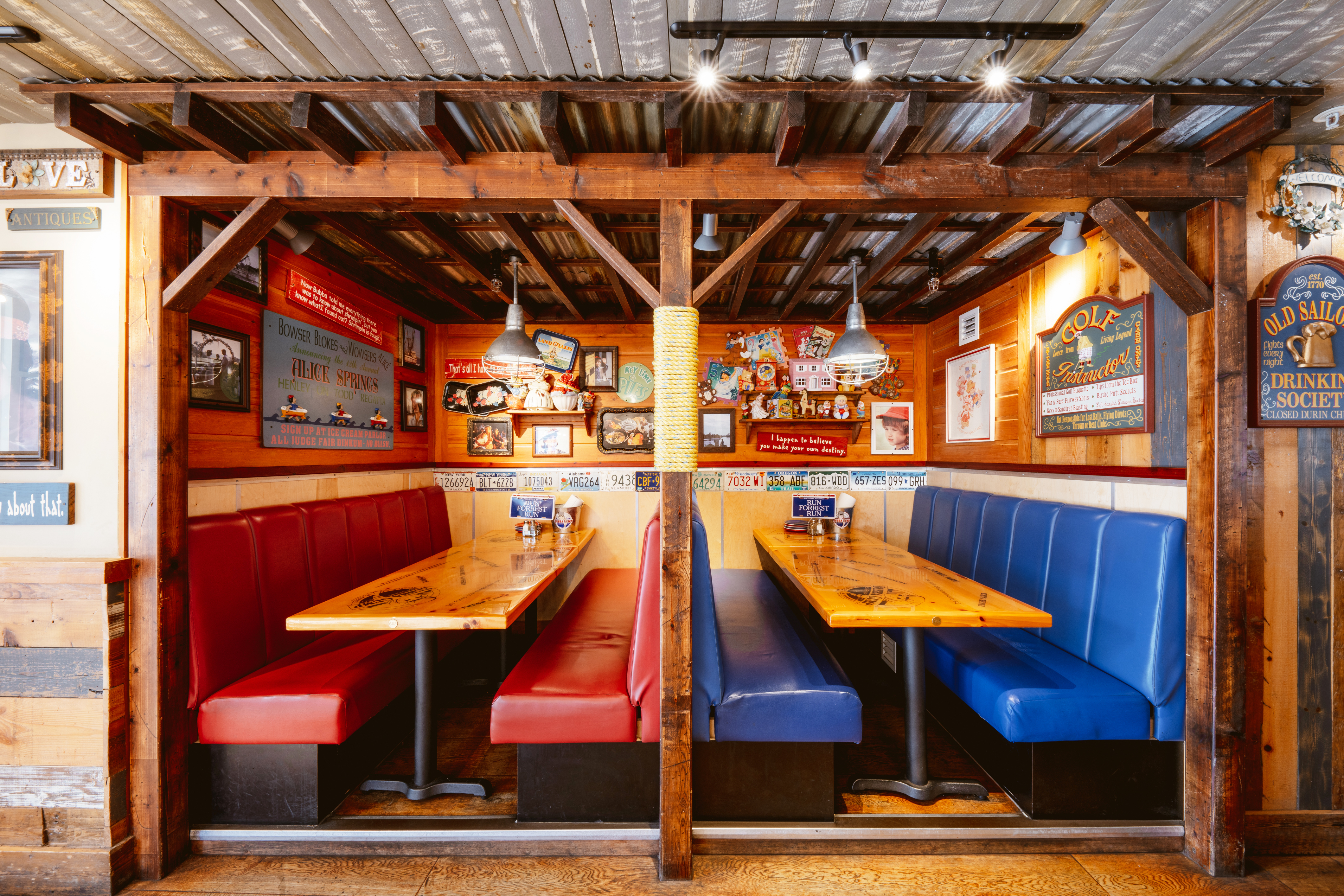 Cozy booths in vibrant venue for casual meetings and team gatherings.