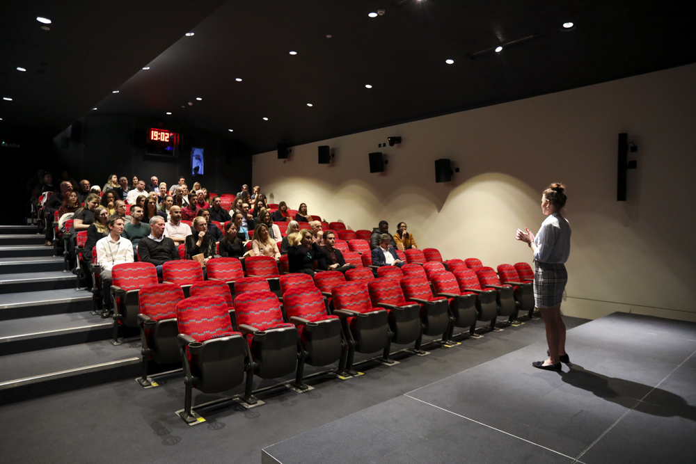 Cubic Theatre at London Transport Museum, tiered red chairs for presentations and workshops.