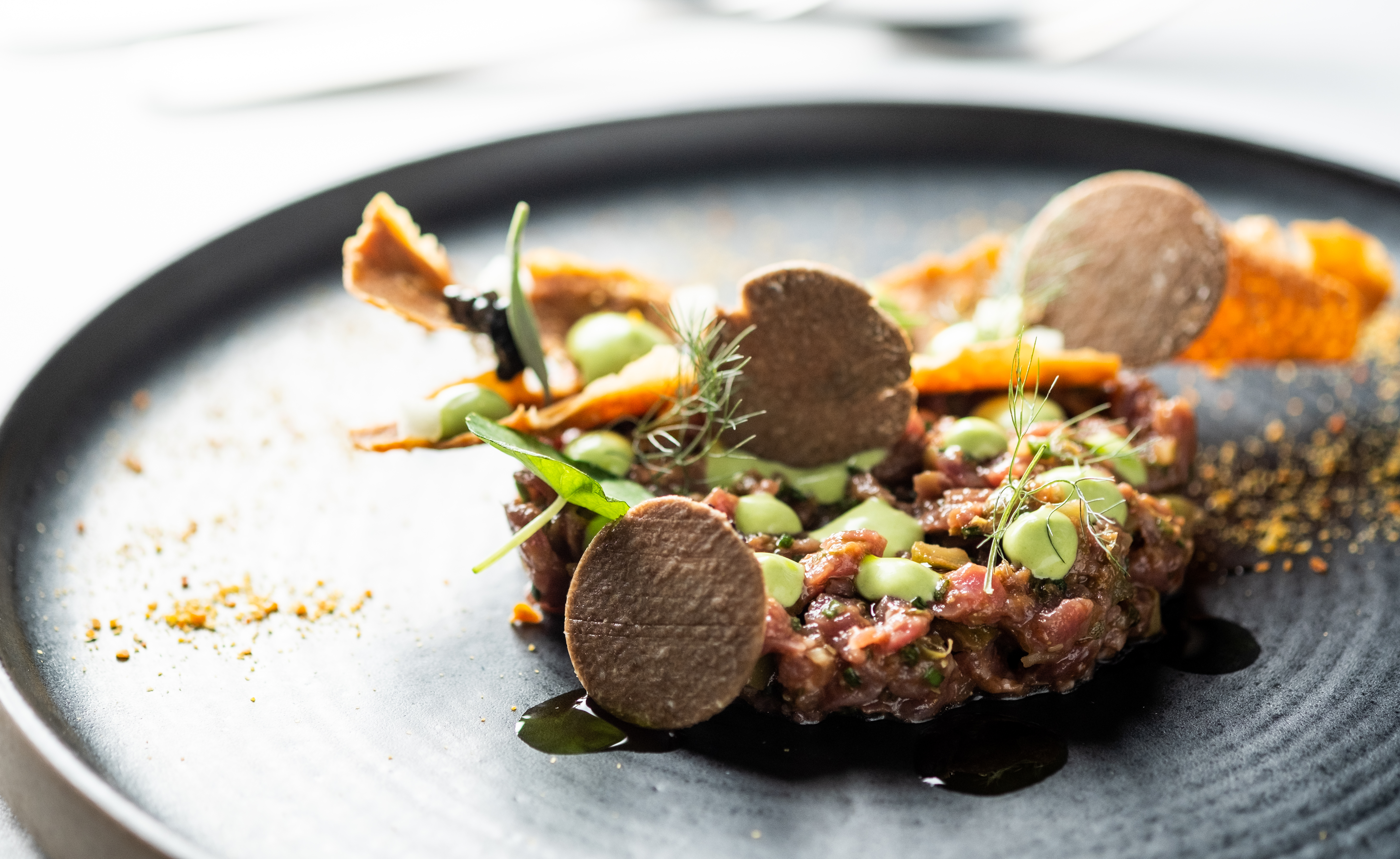 Meticulously plated dish at The Hyde Restaurant, ideal for upscale dining events.