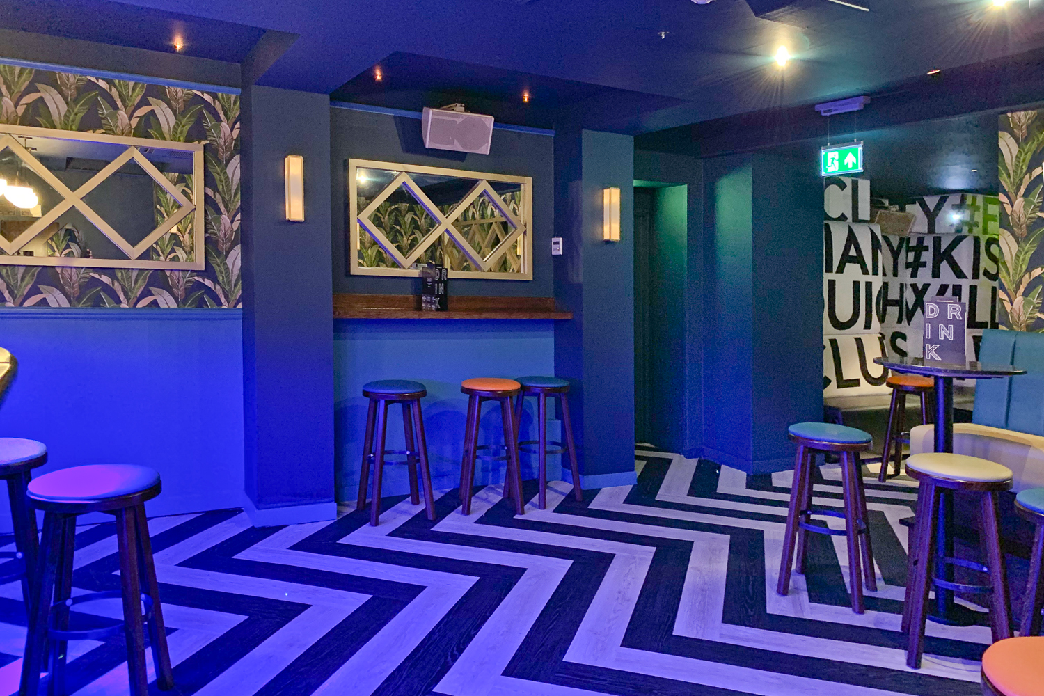 Vibrant Studio 61 event space with bold decor, perfect for networking and gatherings.