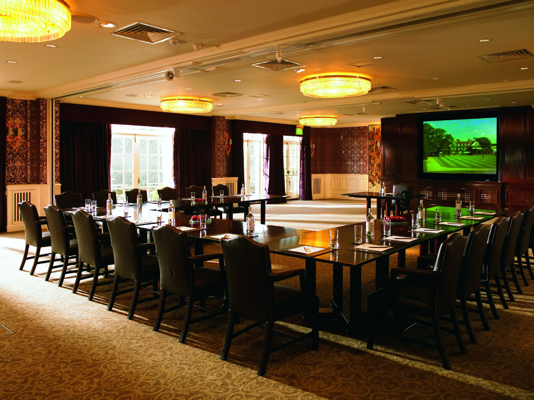 Lake Suite at Chewton Glen: elegant meeting room with natural light for corporate events.