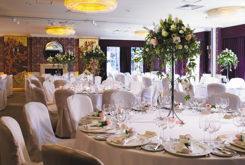 Elegant banquet room at Chewton Glen Hotel, perfect for weddings and formal events.