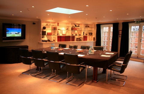 Chewton Glen Hotel meeting room with modern furniture, ideal for conferences and events.