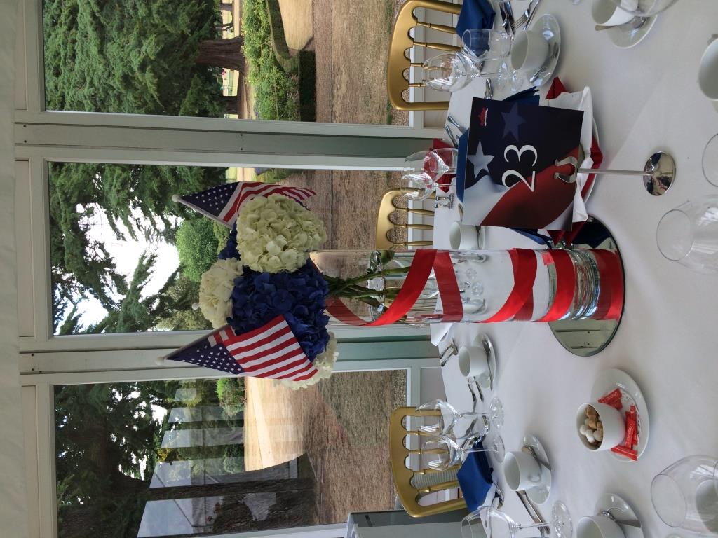 Elegant table centerpiece with blue hydrangeas for patriotic events at Stoke Park.