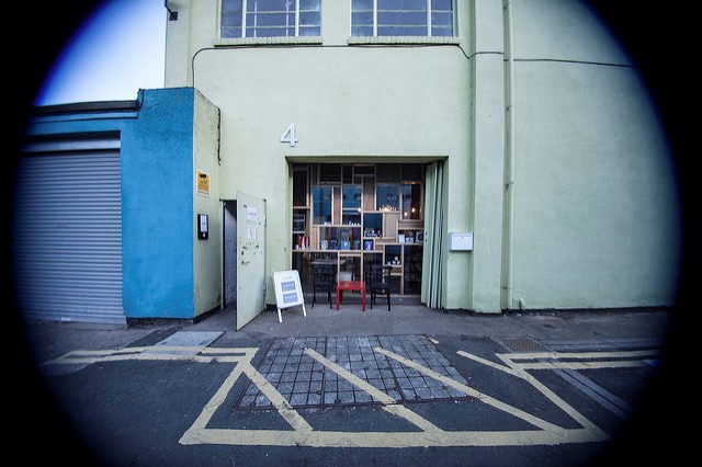 Vibrant meeting room entrance at Centrala Space for creative events and gatherings.
