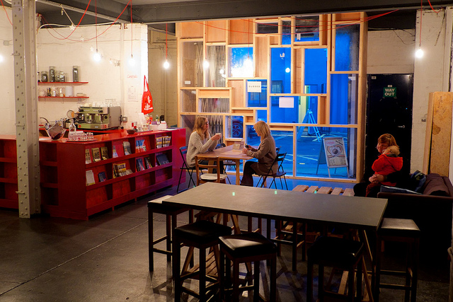 Centrala Gallery event space with warm lighting for meetings and gatherings.