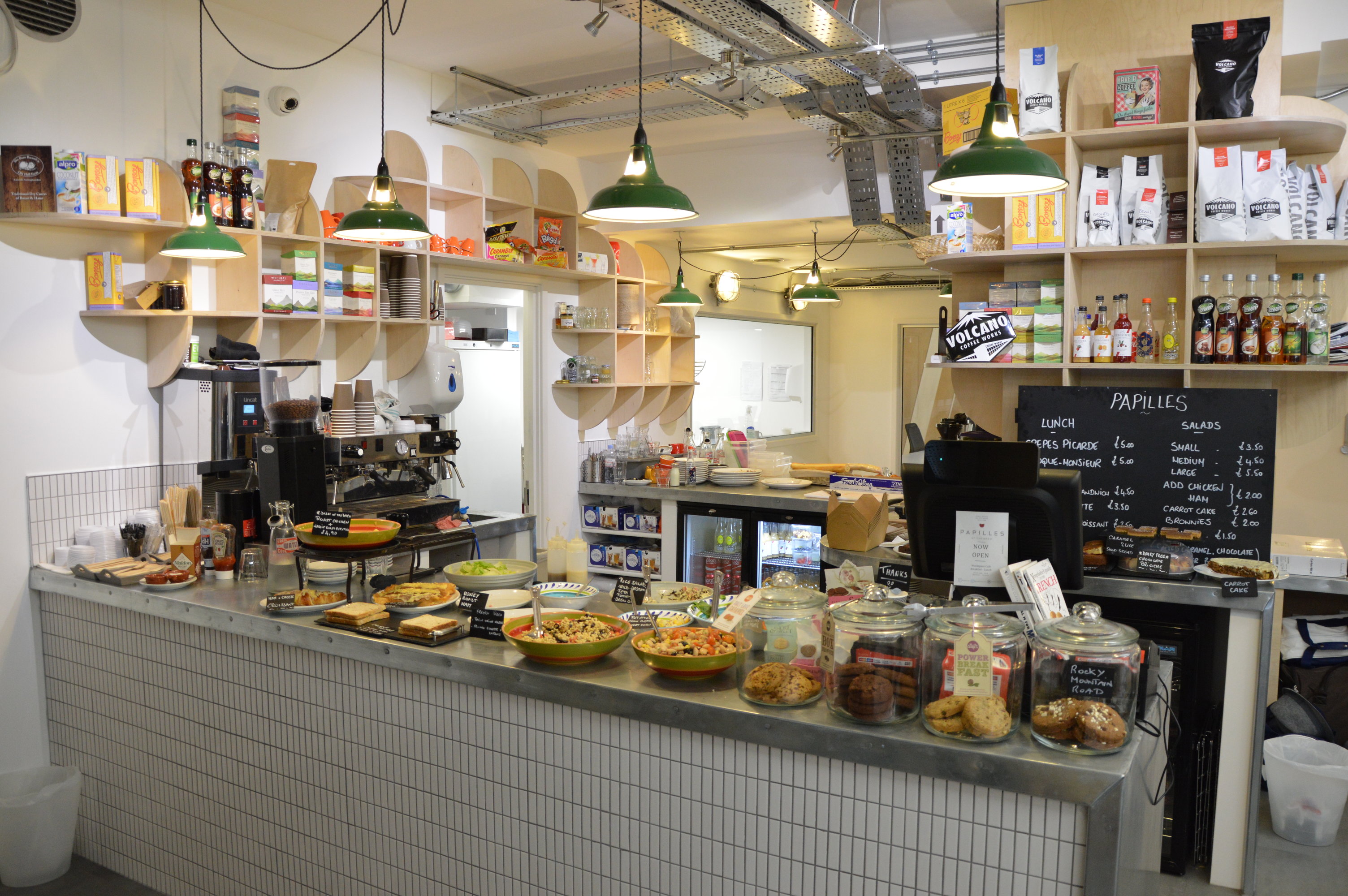 Vibrant café venue with snacks, ideal for networking events and casual meetings.