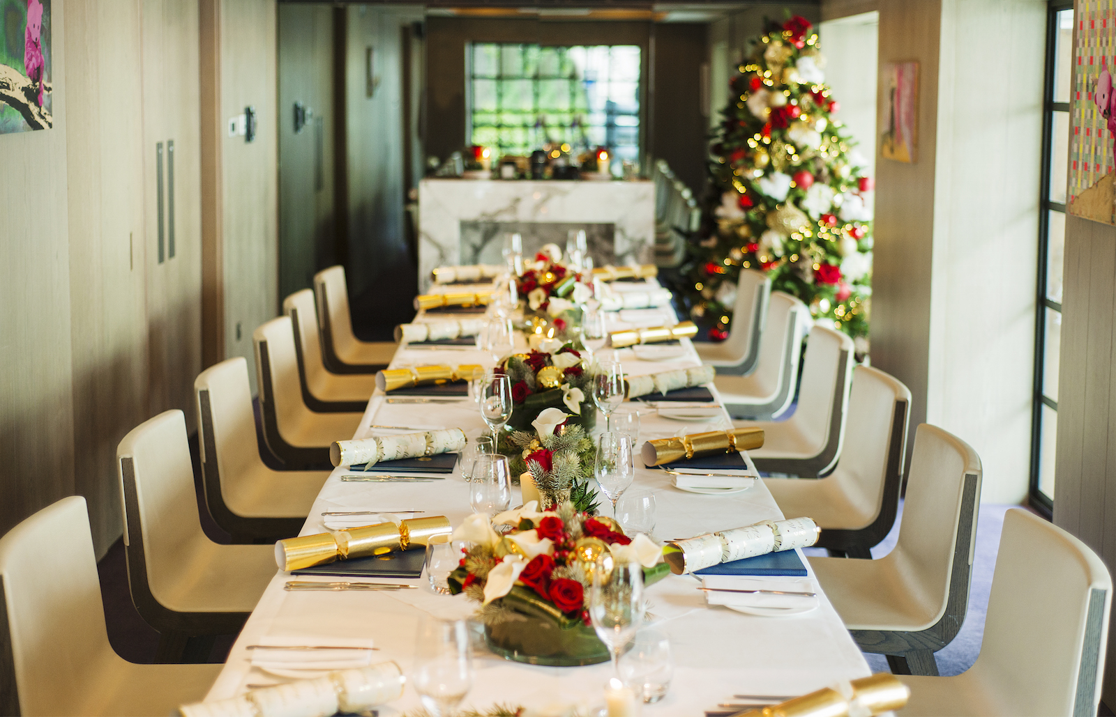 Elegant Christmas party table with floral centerpieces at The Hari.